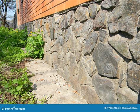 Brick House Foundation Wall from Wild Stone for Waterproofing ...