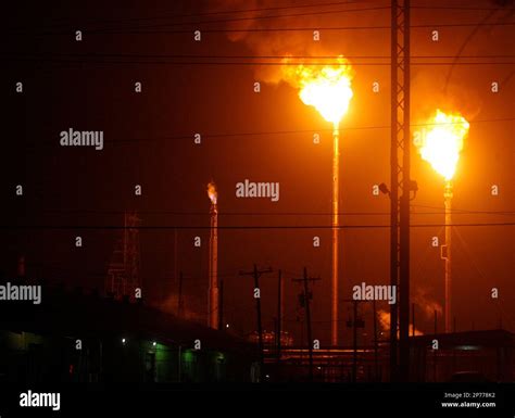 Flares burn after power was lost at BP's Texas City refinery Monday ...