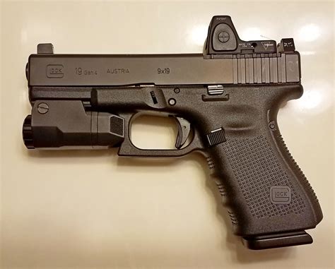 Glock 19 MOS Gen4 with Trijicon RMR Type 2 6.5 MOA, Trijicon Suppressor ...