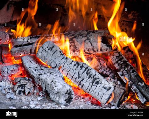 Picture of burning wood in fireplace Stock Photo - Alamy
