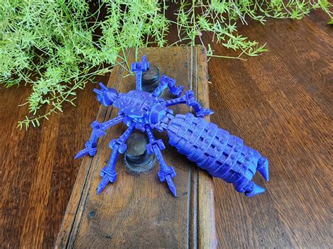 STL file Steampunk Pincher Bug, Earwig, Vibrant Black 3D, Articulating ...