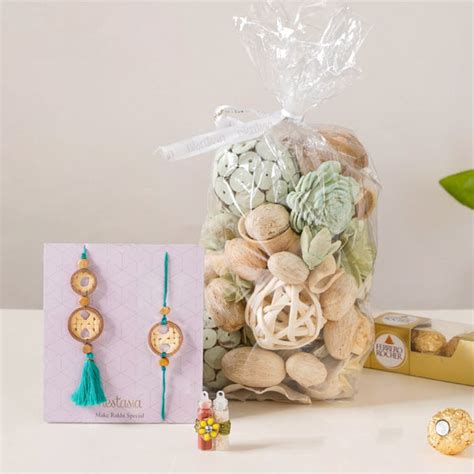 Botanical Rakhi Gifts Set Of 4 Online - Premium Gift Hamper | Nestasia
