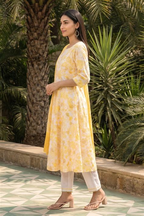 Buy Yellow Paisley Printed Pure Cotton Flared Kurta with Trousers and ...