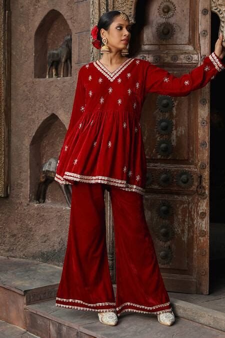 Buy Maroon Velvet Hand Embroidery Work A-line Kurta And Flared Pant Set ...
