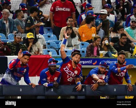 Dominican Republic players cheer from the dugout during the Caribbean ...