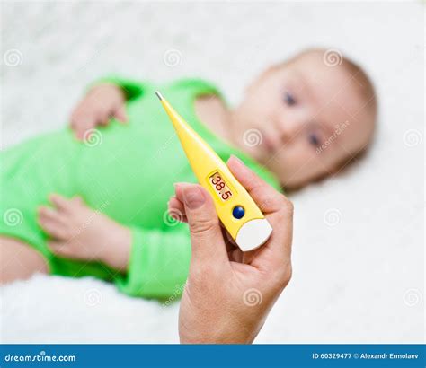 Mom Check the Temperature of Newborn Baby Stock Image - Image of child, medical: 60329477