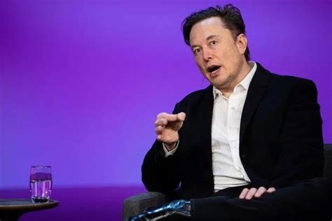 Elon Musk speaks during an interview with head of TED Chris Anderson (out of frame) at the TED2022: