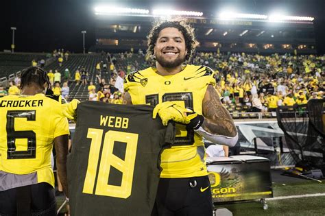 Wearing Spencer Webb’s No. 18, Oregon Ducks tight end Cam McCormick ...
