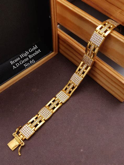 AMIT, BRASS HIGH GOLD FINISH WITH AMERICAN DIAMOND STONES ELEGANT BRAC ...