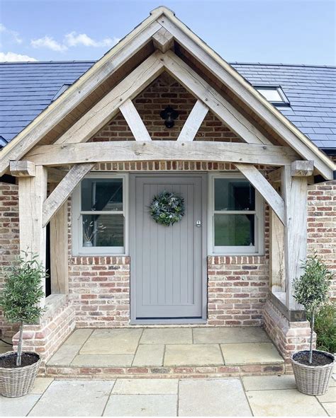 Painted tongue groove front door and oak porch – Artofit