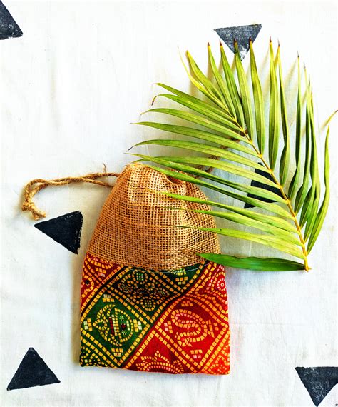 Yellow Mirrorwork Potli Bag – Handmakers.in