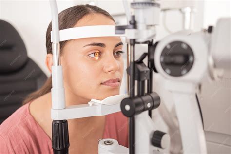 Premium Photo | Vision ophthalmology and woman in eye exam with light ...