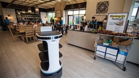 Primo, a robot waiter, serves at Cafotteria Modern Eatery in Lakewood