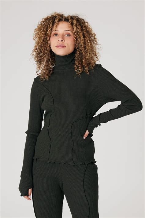 The 15 Best Black Turtlenecks for Women to Wear in 2023