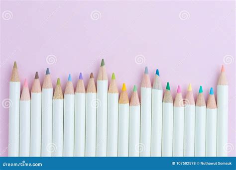 Cute Pastel Color Pencils On Light Yellow Paper Background With Royalty ...