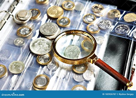 Numismatic Coins with Magnifying Glass Stock Image - Image of ...