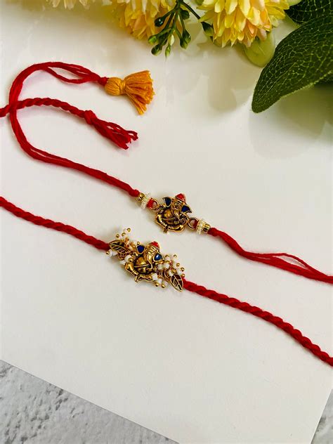 Ganesha Divine Bead Bhai Bhabhi Rakhi Set – Madhurya Rakhi