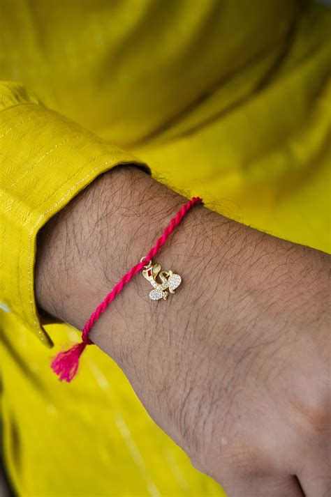 Divine Ganesha Gold Plated Sterling Silver Rakhi With Lumba Combo | 925 ...