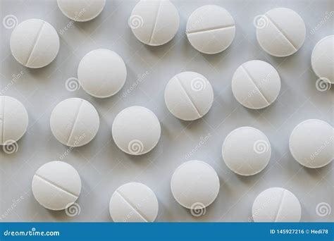White round pills stock photo. Image of pharmaceutical - 145927216