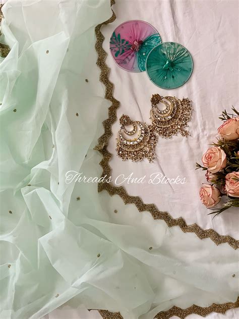 Mint Cutwork Border Saree – Threads & Blocks