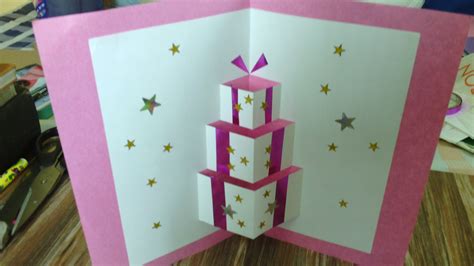 A hand made present pop up card. This is great for birthdays or ...