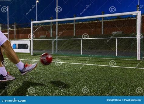 Kicking a Soccer Ball into the Net with Your Foot. Stock Photo - Image ...