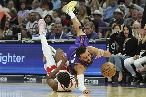 Rockets rout Suns 148-109 as Phoenix star Durant leaves with ankle ...