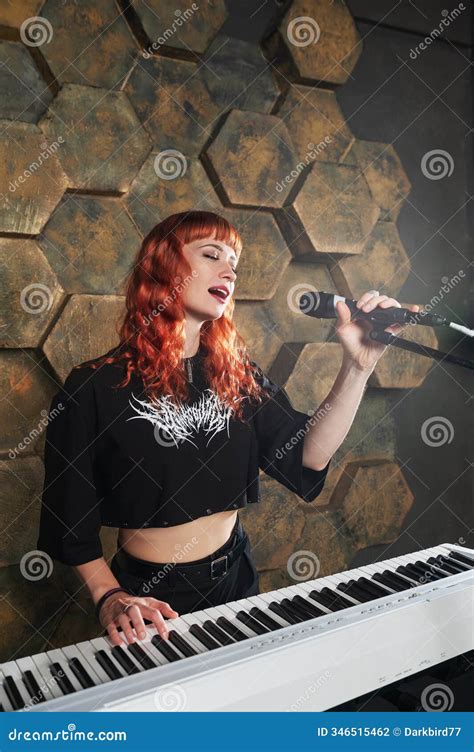 Female Red-haired Singer Musician Showcases Talent and Style during a ...