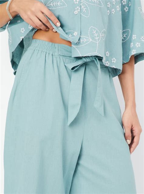 Buy Women Solid Tie-Up Waist Palazzos Online at just Rs. 899.0 ...