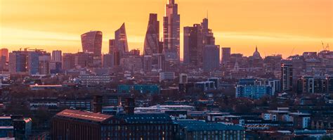 Download wallpaper 2560x1080 city, sunset, aerial view, buildings ...