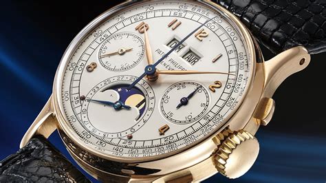 Reference 1518 | A pink gold perpetual calendar chronograph wristwatch ...