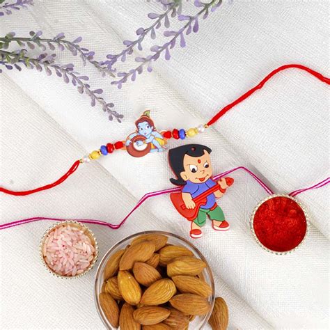 Send Two Kids Rakhi with Cashew Nuts Online | Rakhibazaar.com