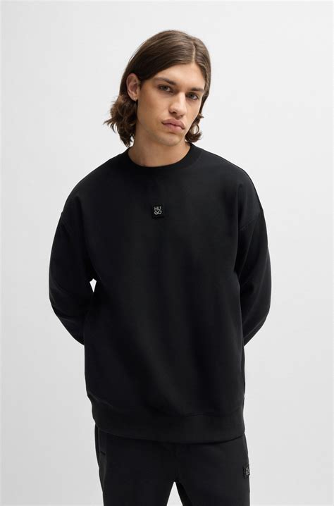 HUGO - Stretch-cotton regular-fit sweatshirt with stacked logo - Black
