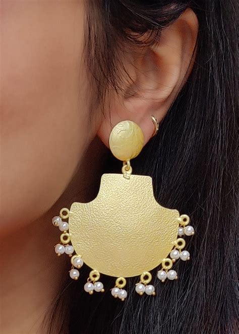 Get Pearl Detail Gold Textured Fan Earrings at ₹ 1750 | LBB Shop
