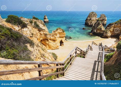 Wooden Footbridge To Beautiful Beach Praia Do Camilo Near Lagos in ...