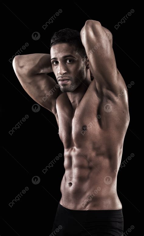 Homem Musculoso Em Um Fundo Preto Físico Masculino Abs Foto E Imagem ...