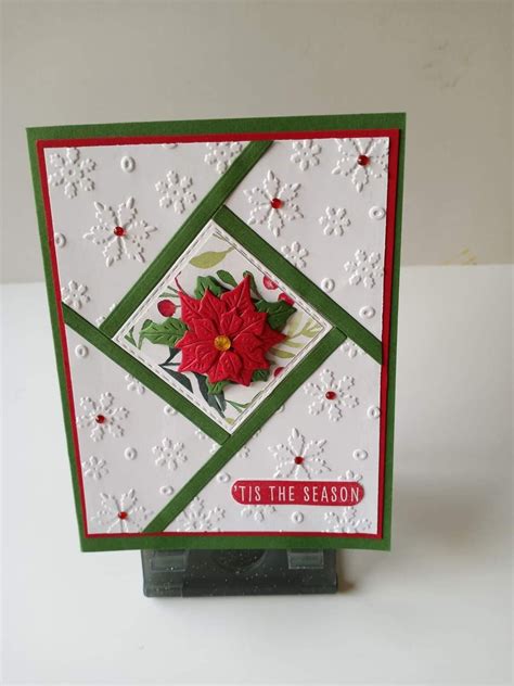 Handcrafted Christmas Card with Poinsettias and Snowflakes