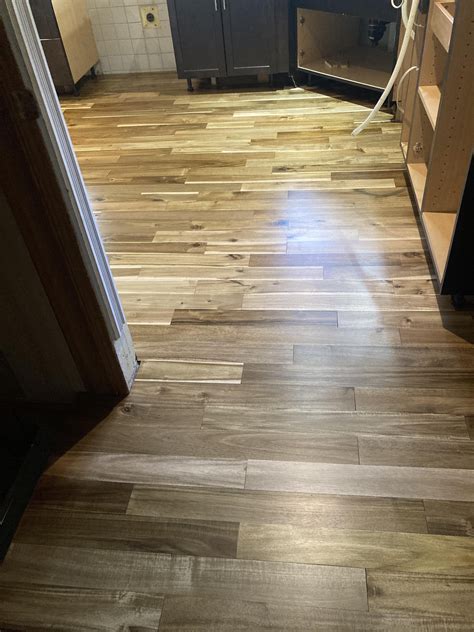 Help! Refinished hardwood floor stain looks like two different colors ...