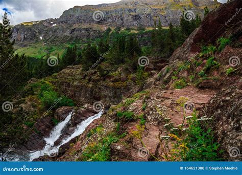 Red Rock Falls at Many Glacier, Glacier National Park Stock Photo ...