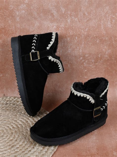 Women Black Solid Snug Boots – ShoeTree