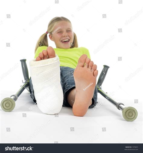 Girl With A Broken Leg (Close-Up Of Feet, One With A Plaster Bandage) Stock Photo 1970031 ...