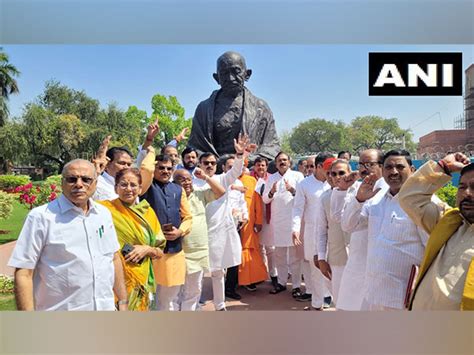 BJP's OBC MPs hold protest in front of Gandhi statue at Parliament ...