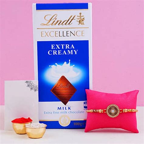 Send Sparkling Sun Rakhi And Lindt Chocolate Online