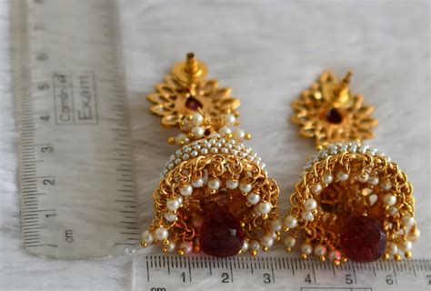 Antique gold tone pink pearl cluster tilak jhumkka dj-47876 – dreamjwell