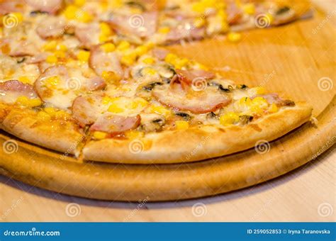 Delicious Fresh Pizza with Ham, Mushrooms, Corn on Wooden Tray and ...