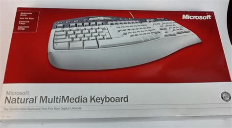 Image result for Microsoft Wireless Natural Multimedia Keyboard Receiver