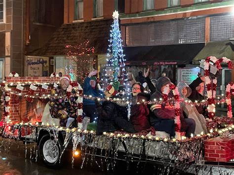 Solid, Cheerful Crowd at Night of Lights Parade Despite Rainy Weather ...