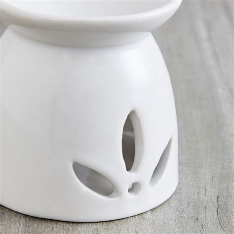 Buy Spinel Flower Pattern Oil Burner from Home Centre at just INR 99.0
