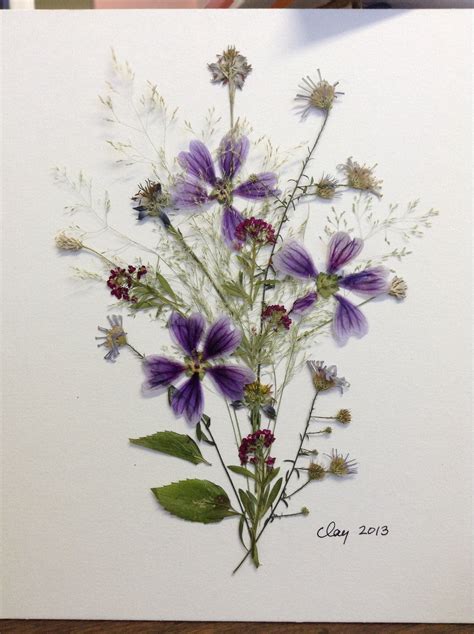 By Amie Clay... Pressed flower art with some flowers picked locally ...