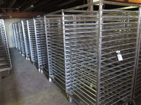 { Group of lots: 80, 81 } Stainless Steel Rolling Bakers Racks (10)